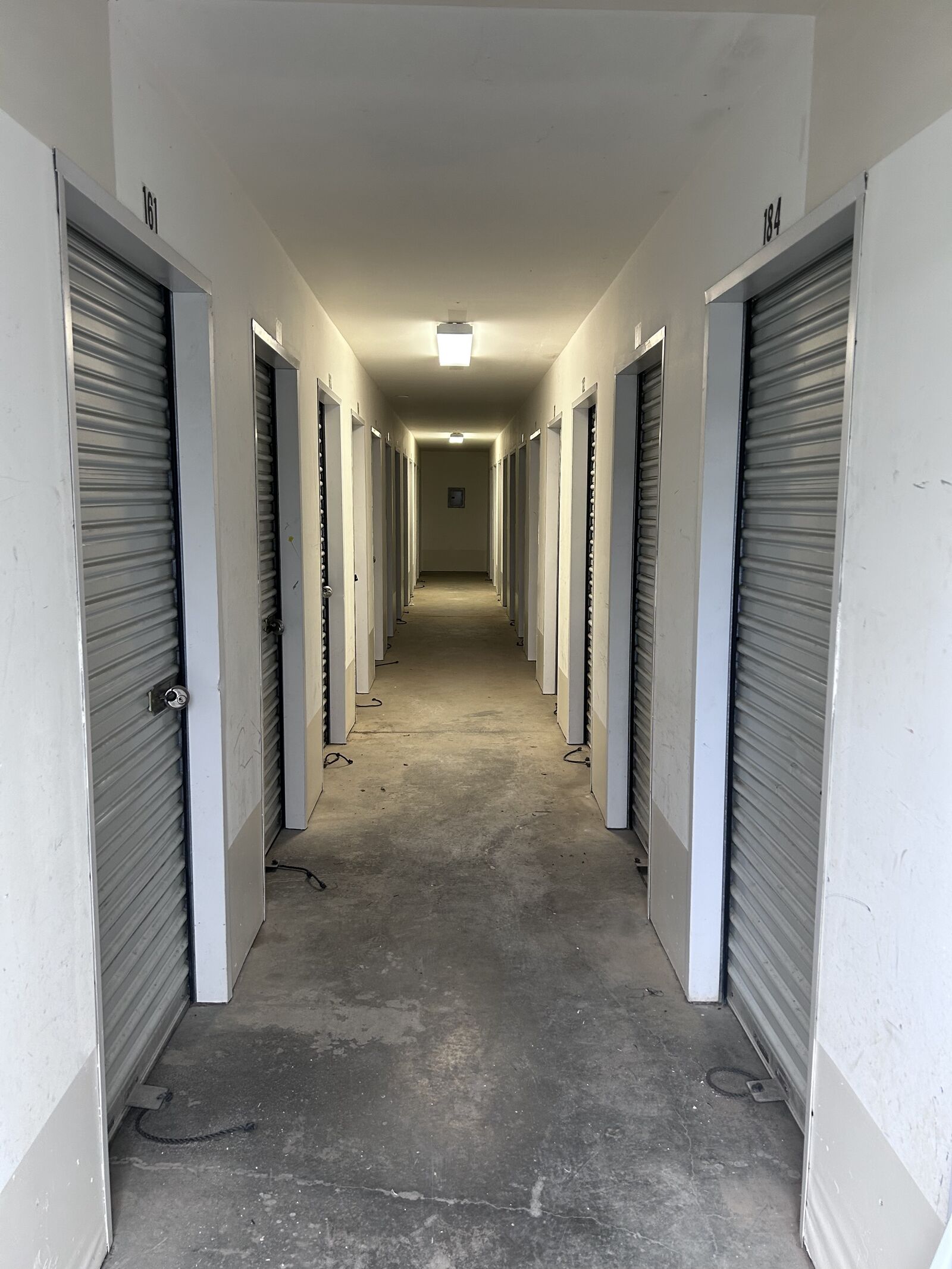 Climate-controlled hallway of 5x5 storage units at Coastal Apartments & Storage